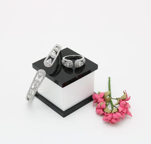 A ring set with a bracelet made of zircon stones