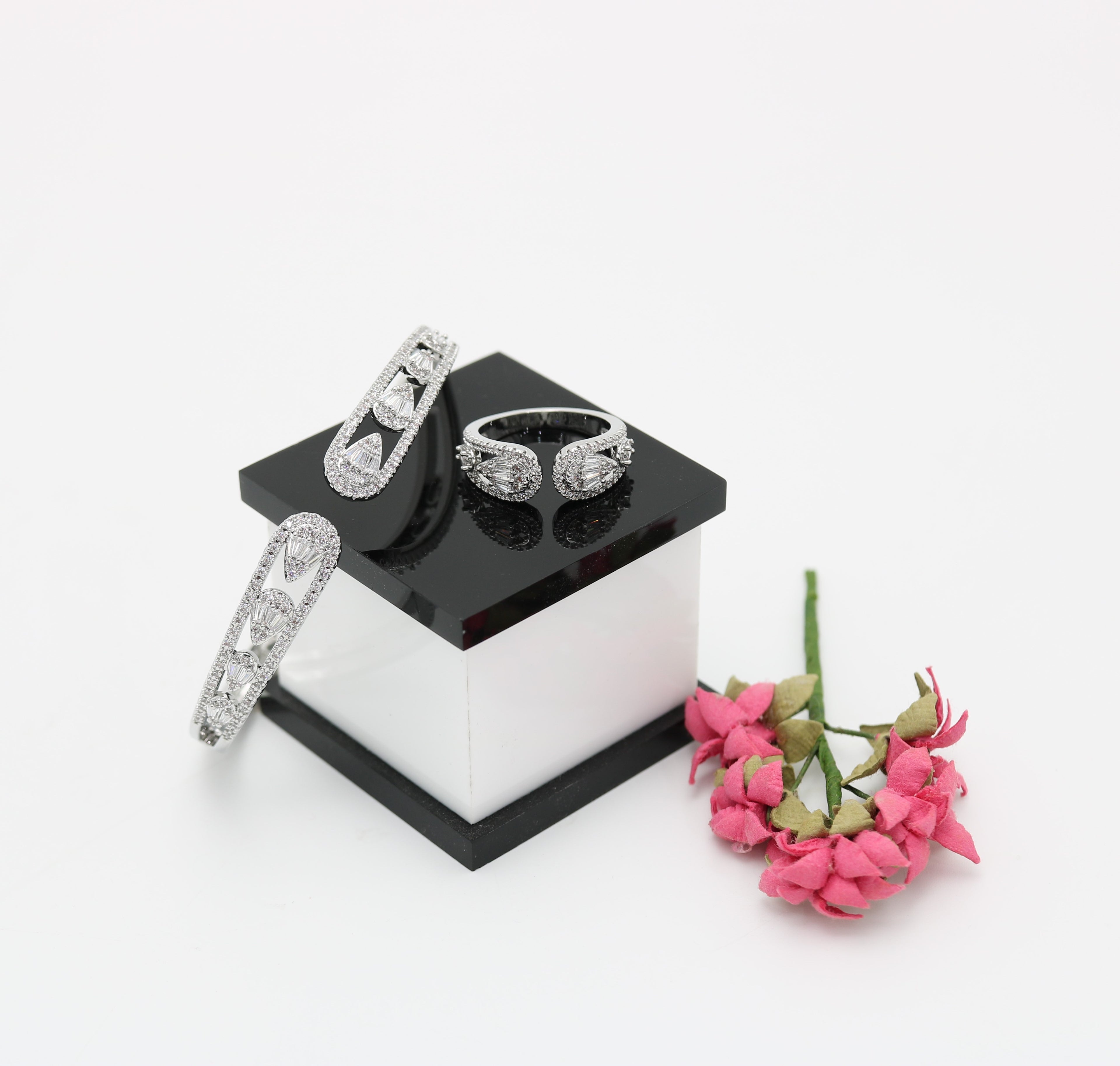 A ring set with a bracelet made of zircon stones