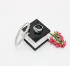 A ring set with a bracelet made of zircon stones