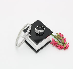 A ring set with a bracelet made of zircon stones