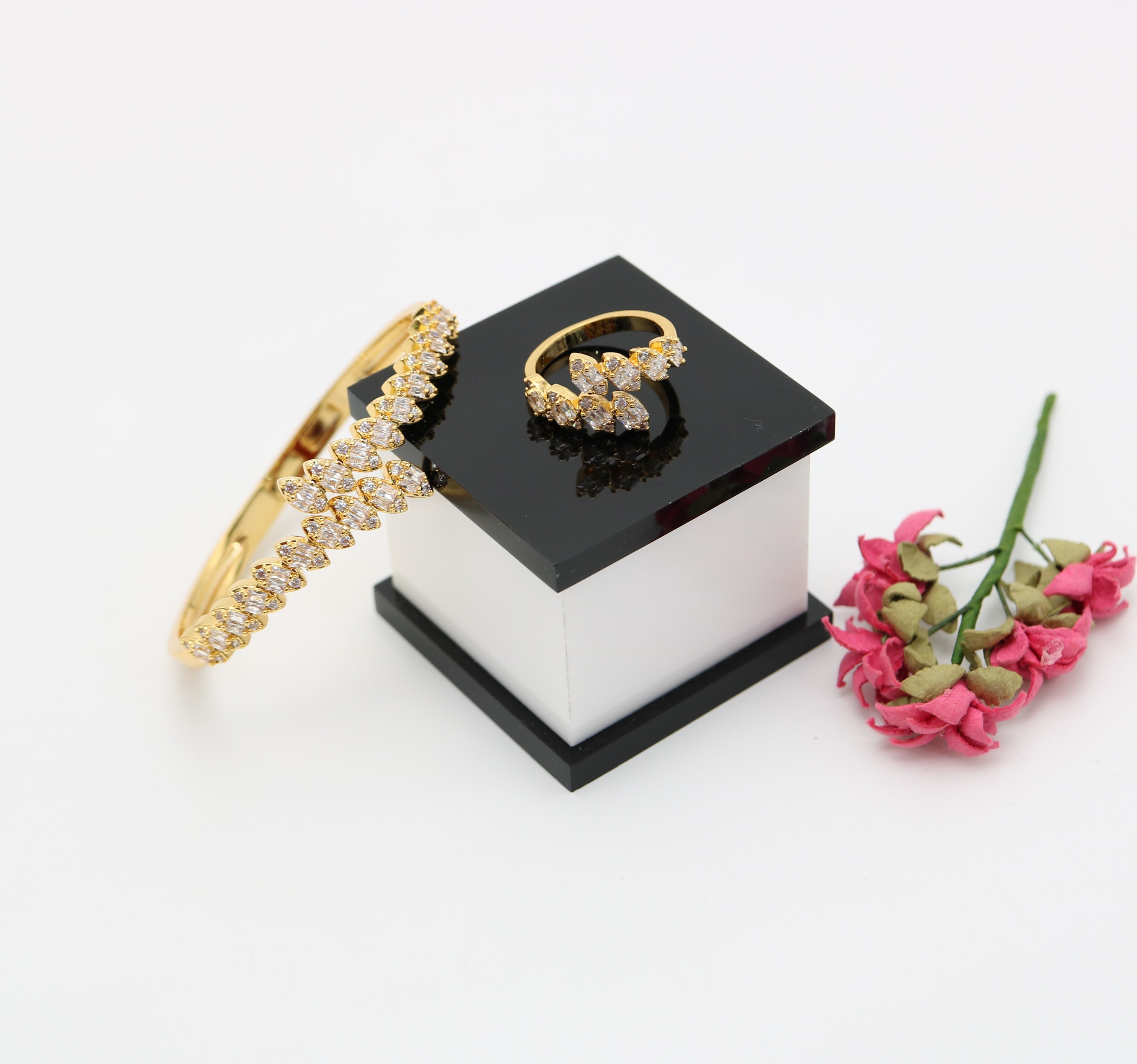 A ring set with a bracelet made of zircon stones