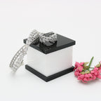 A ring set with a bracelet made of zircon stones
