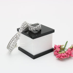 A ring set with a bracelet made of zircon stones