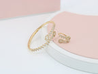 A ring set with a bracelet made of zircon stones