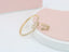 A ring set with a bracelet made of zircon stones