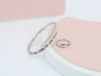 A ring set with a bracelet made of zircon stones