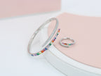 A ring set with a bracelet made of zircon stones