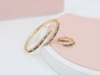 A ring set with a bracelet made of zircon stones