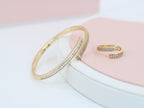 A ring set with a bracelet made of zircon stones