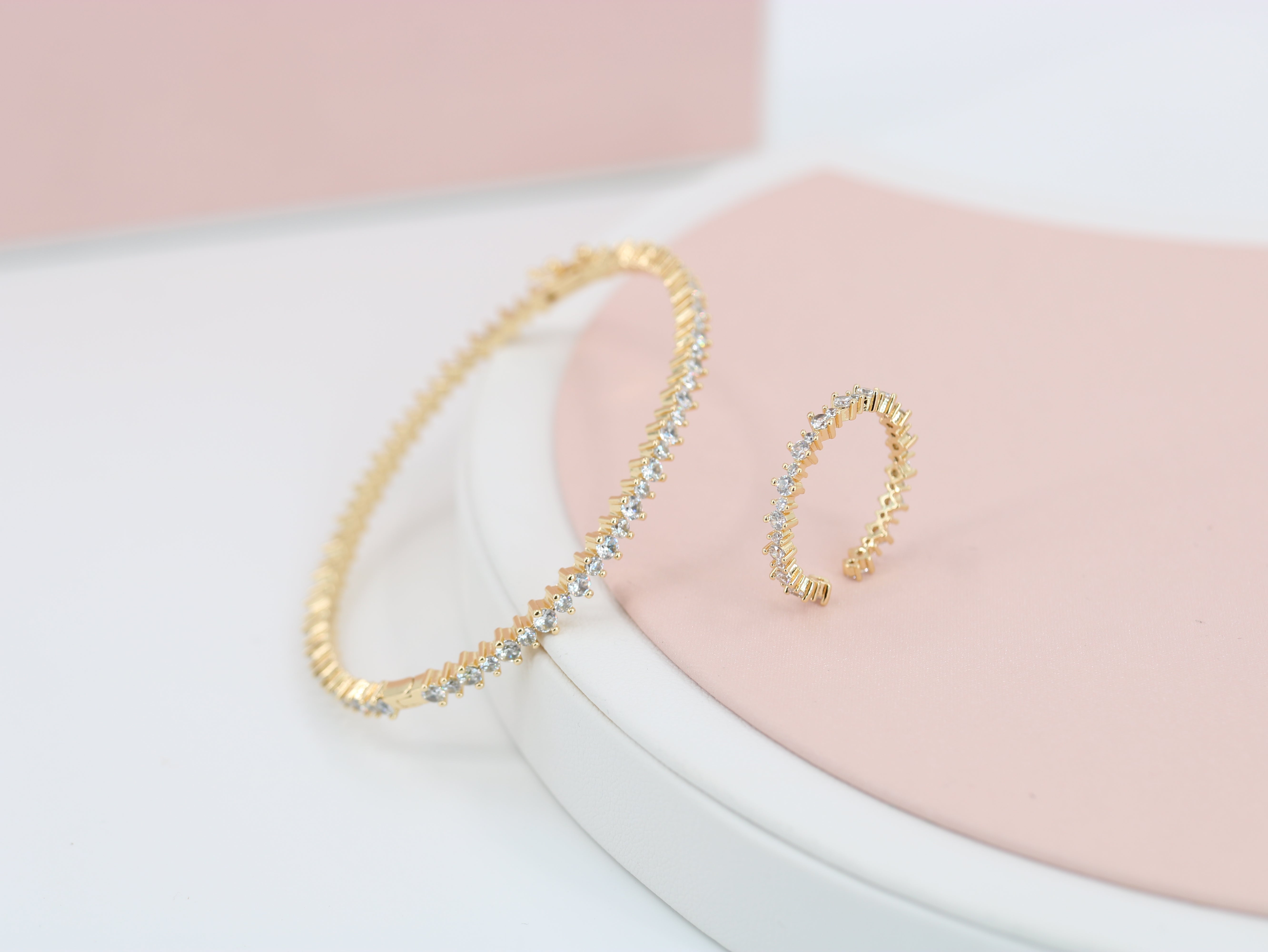 A ring set with a bracelet made of zircon stones Secondary image