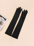 Women's shiny evening gloves